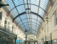 A photograph of a shopping center